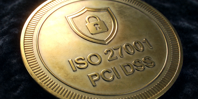 国际安全认证证书展示 - 带有盾牌、锁图标及“ISO 27001”、“PCI DSS”等字样的金色证书特写